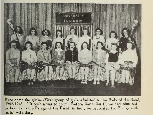 Women posed in two rows with their instruments.