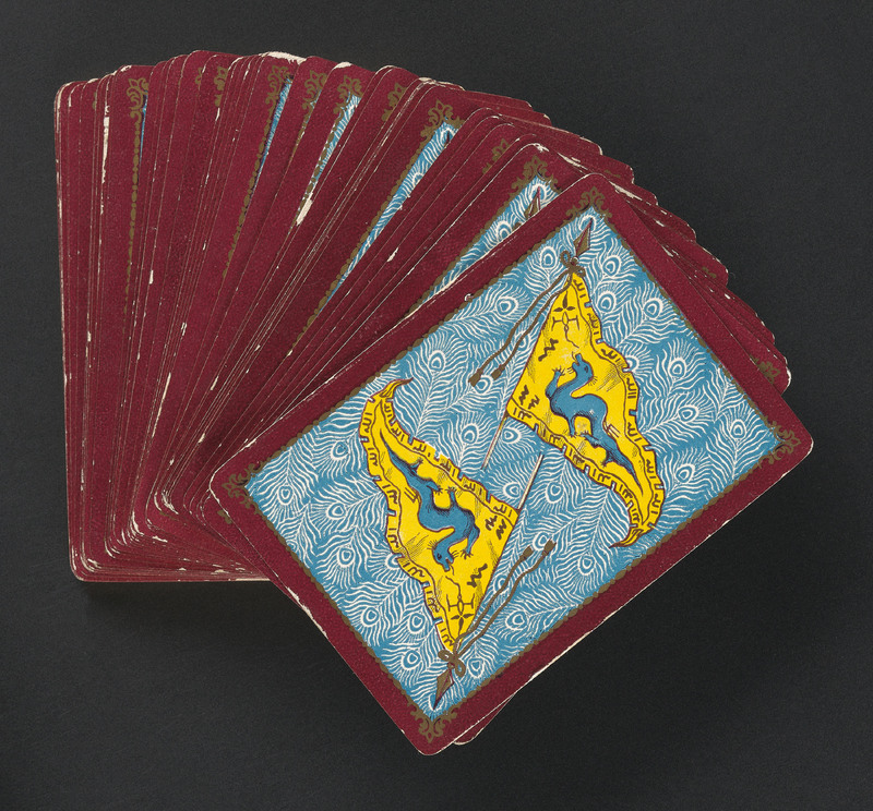 A deck of cards face down and fanned out.