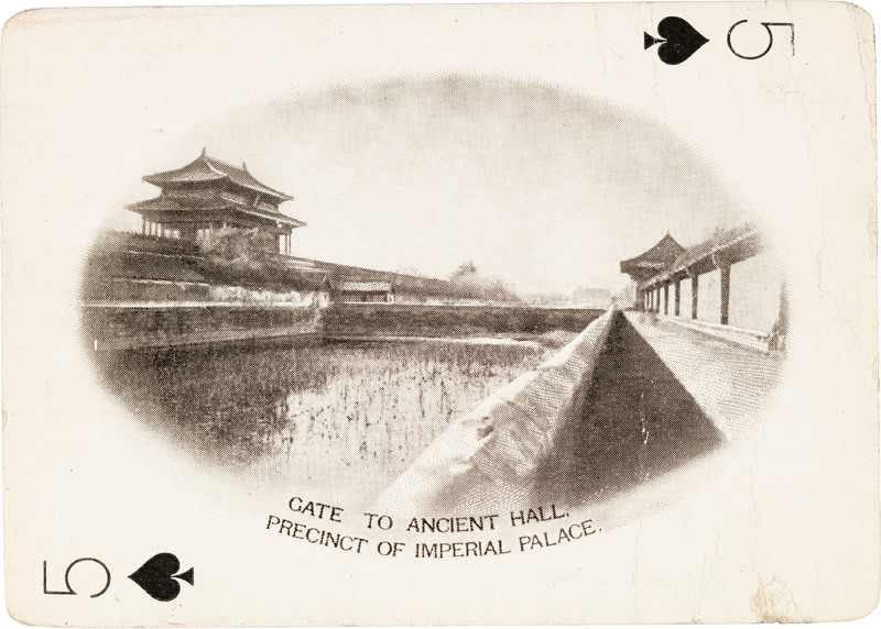 The 5 of spades with a picture of a large gate complex outside the imperial palace