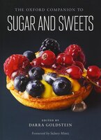 Cover of the Oxford Companion to Sugar and Sweets with a fruit tart.