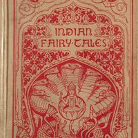 Cover of Indian Fairy Tales. Title and illustration in red. Below title, image of buddha holding a key, surrounded by a seven-headed hooded snake.