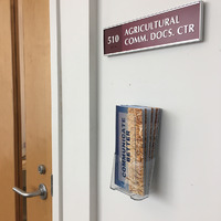 An image of the signage and door to the Agricultural Communication and Documentation Center